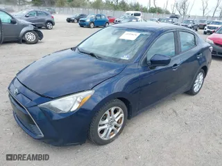 2017 Toyota Yaris iA with VIN 3MYDLBYV5HY169342, listed as a IAAI auction lot 41919676 with 100,893 mi miles. Bid and sale history available at carsss.com. Image 2.