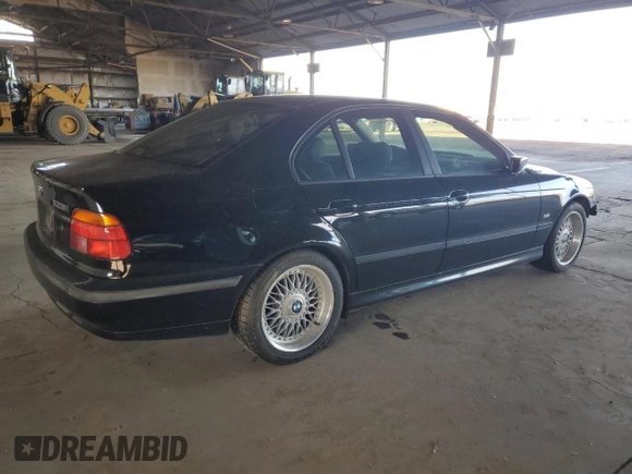 1999 BMW 5 Series 528iA with VIN WBADM6344XBY34517, listed as a Copart auction lot 51803145 with 186,637 mi miles and Salvage Title. Bid and sale history available at carsss.com. Image 3.