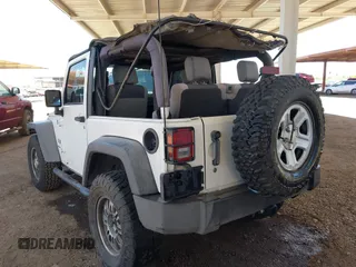 2007 Jeep Wrangler X with VIN 1J4FA24137L128418, listed as a IAAI auction lot 42317921 with 148,412 mi miles and . Bid and sale history available at DreamBid. Image 3.