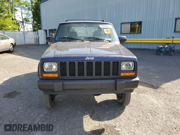 1999 Jeep Cherokee SE with VIN 1J4FF28S0XL541871, listed as a Copart auction lot 59250264 with Not provided miles and Salvage title. Bid and sale history available at DreamBid. Image 5.
