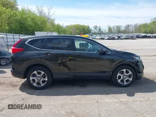 2018 Honda CR-V EX-L z VIN 7FARW2H82JE021578, wystawiony jako IAAI lot #42215280 z przebiegiem 82 571 mil mil oraz . Historia ofert i sprzedaży dostępna na DreamBid. Obrazek 13.