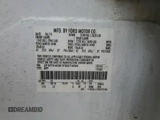 2015 Ford Edge SE with VIN 2FMTK4G81FBB74592, listed as a Copart auction lot 56417845 with 113,084 mi miles and Salvage title. Bid and sale history available at DreamBid. Image 12.