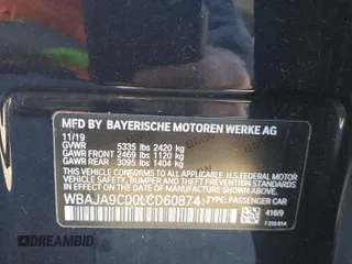 2020 BMW 5 Series 530e with VIN WBAJA9C00LCD60874, listed as a Copart auction lot 87960825 with 91,036 mi miles and Salvage Title. Bid and sale history available at DreamBid. Image 12.