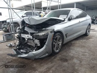 2016 BMW 3 Series 328i Gran Turismo xDrive z VIN WBA8Z5C59GG501996, wystawiony jako IAAI lot #41238964 z przebiegiem 71 542 mil mil oraz . Historia ofert i sprzedaży dostępna na DreamBid. Obrazek 2.