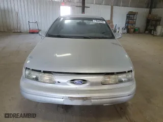 1995 Ford Taurus GL with VIN 1FALP52U3SG100518, listed as a Copart auction lot 71844764 with 173,762 mi miles and Salvage Title. Bid and sale history available at carsss.com. Image 5.