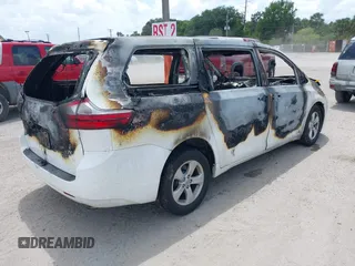2015 Toyota Sienna L with VIN 5TDZK3DC2FS538700, listed as a IAAI auction lot 42180289 with Not provided miles and . Bid and sale history available at DreamBid. Image 4.