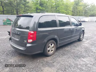 2011 Dodge Grand Caravan Crew with VIN 2D4RN5DG2BR706668, listed as a IAAI auction lot 39440091 with 191,666 mi miles and . Bid and sale history available at DreamBid. Image 4.