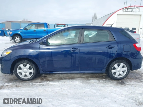 2009 Toyota Matrix with VIN 2T1KU40E69C045320, listed as a IAAI auction lot 41481764 with 162,766 mi miles. Bid and sale history available at carsss.com. Image 15.
