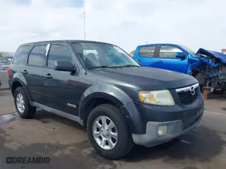 2008 Mazda Tribute ES with VIN 4F2CZ06188KM01024, listed as a IAAI auction lot 41890148 with 122,367 mi miles. Bid and sale history available at carsss.com. Image 1.