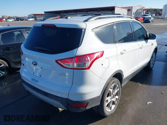 2013 Ford Escape SE with VIN 1FMCU0G9XDUD01410, listed as a IAAI auction lot 41758032 with 154,208 mi miles. Bid and sale history available at carsss.com. Image 4.