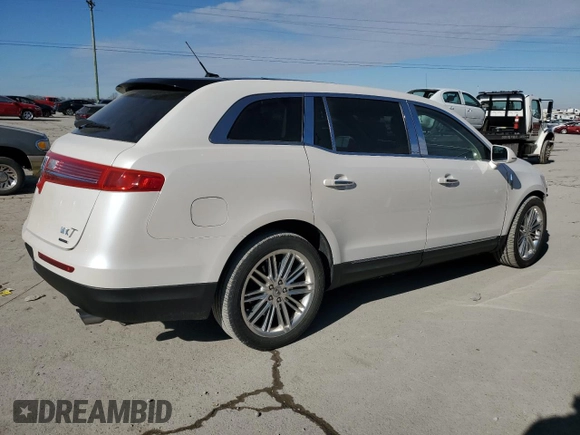 2016 Lincoln MKT EcoBoost z VIN 2LMHJ5AT5GBL01314, wystawiony jako Copart lot #88693385 z przebiegiem 75 777 mil mil oraz Szkoda całkowita • Salvage title. Historia ofert i sprzedaży dostępna na DreamBid. Obrazek 3.