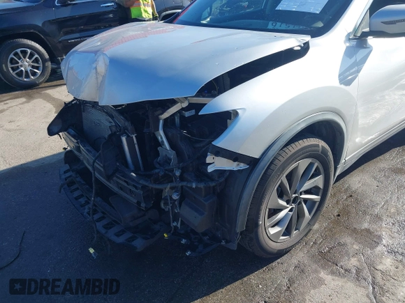 2016 Nissan Rogue SV with VIN KNMAT2MV6GP733975, listed as a IAAI auction lot 40775934 with 68,718 mi miles and . Bid and sale history available at DreamBid. Image 20.