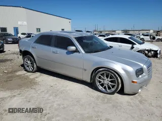 2006 Chrysler 300 C SRT8 with VIN 2C3KA73W76H101950, listed as a Copart auction lot 48501125 with 144,696 mi miles and Salvage Title. Bid and sale history available at carsss.com. Image 4.