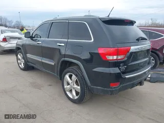 2012 Jeep Grand Cherokee Overland with VIN 1C4RJFCG3CC148601, listed as a IAAI auction lot 41717658 with 127,681 mi miles. Bid and sale history available at carsss.com. Image 3.