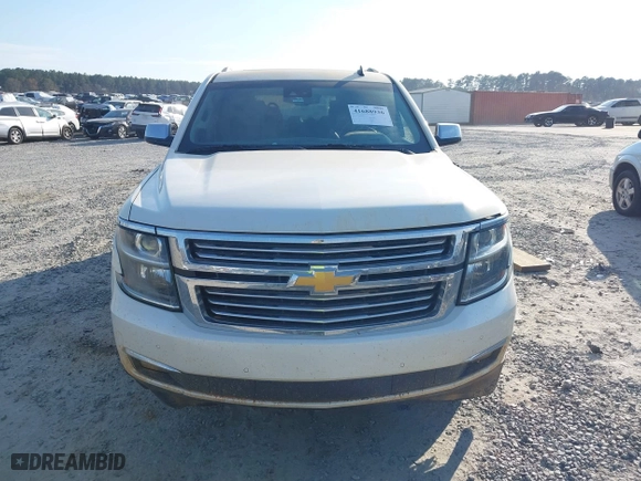 2015 Chevrolet Tahoe LTZ with VIN 1GNSCCKCXFR287609, listed as a IAAI auction lot 41688936 with 112,678 mi miles. Bid and sale history available at carsss.com. Image 13.