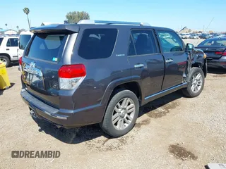 2010 Toyota 4Runner Trail with VIN JTEBU5JR7A5025985, listed as a IAAI auction lot 42002858 with 161,392 mi miles and . Bid and sale history available at DreamBid. Image 4.