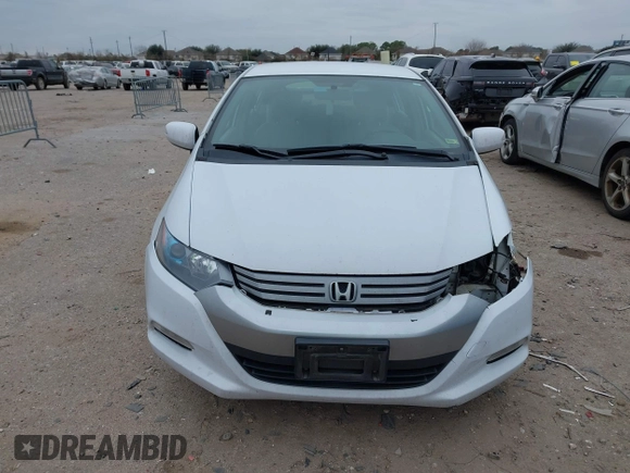 2010 Honda Insight EX with VIN JHMZE2H71AS035091, listed as a IAAI auction lot 41380128 with 181,653 mi miles and . Bid and sale history available at DreamBid. Image 13.