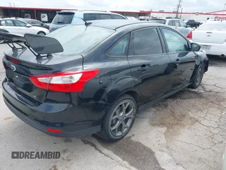 2012 Ford Focus SE with VIN 1FAHP3F28CL361932, listed as a IAAI auction lot 42142318 with 135,179 mi miles and . Bid and sale history available at carsss.com. Image 4.