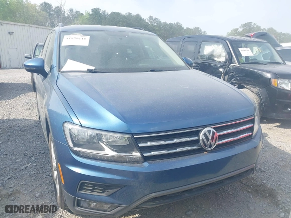 2018 Volkswagen Tiguan S with VIN 3VV0B7AXXJM018455, listed as a IAAI auction lot 41979115 with 92,104 mi miles. Bid and sale history available at carsss.com. Image 6.