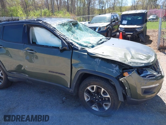 2018 Jeep Compass Trailhawk with VIN 3C4NJDDB0JT241163, listed as a IAAI auction lot 41986193 with 89,246 mi miles and . Bid and sale history available at DreamBid. Image 14.