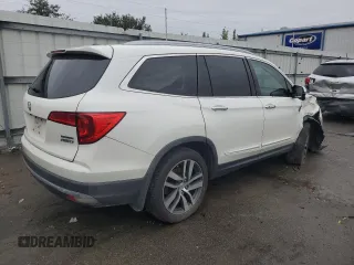 2017 Honda Pilot Touring with VIN 5FNYF6H99HB025600, listed as a Copart auction lot 88131475 with 131,939 mi miles and Salvage Title. Bid and sale history available at DreamBid. Image 3.