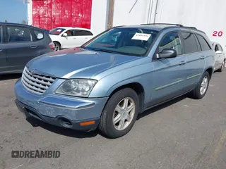2005 Chrysler Pacifica Touring with VIN 2C8GF68475R434354, listed as a IAAI auction lot 42004496 with 212,092 mi miles and . Bid and sale history available at DreamBid. Image 2.