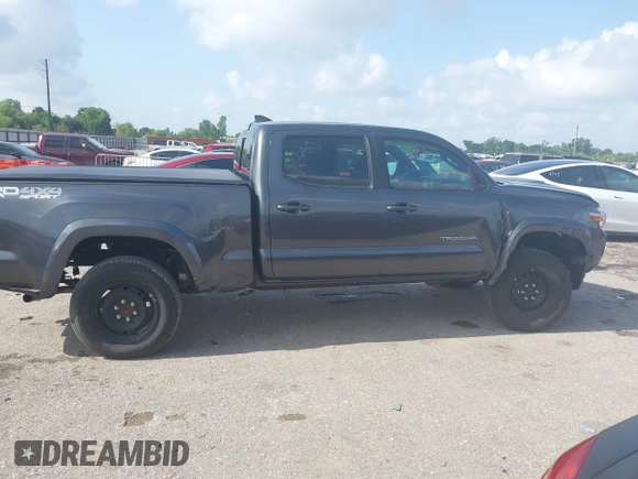 2018 Toyota Tacoma SR5 with VIN 3TMDZ5BN0JM051283, listed as a IAAI auction lot 42438690 with 106,155 mi miles and . Bid and sale history available at DreamBid. Image 13.