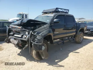 2014 Toyota Tacoma PreRunner with VIN 5TFJX4GN5EX036824, listed as a Copart auction lot 53106185 with 166,843 mi miles and Salvage title. Bid and sale history available at DreamBid. Image 1.