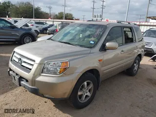 2006 Honda Pilot EX-L with VIN 5FNYF28586B039412, listed as a IAAI auction lot 41543393 with 223,685 mi miles. Bid and sale history available at carsss.com. Image 2.