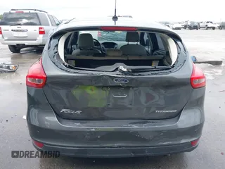 2017 Ford Focus Titanium with VIN 1FADP3N20HL210364, listed as a IAAI auction lot 42130643 with 132,312 mi miles and . Bid and sale history available at DreamBid. Image 20.
