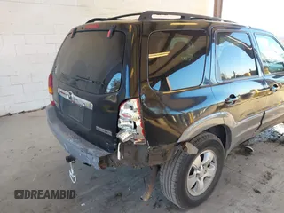 2002 Mazda Tribute LX with VIN 4F2CU08172KM58561, listed as a IAAI auction lot 41435407 with 141,908 mi miles and . Bid and sale history available at carsss.com. Image 6.