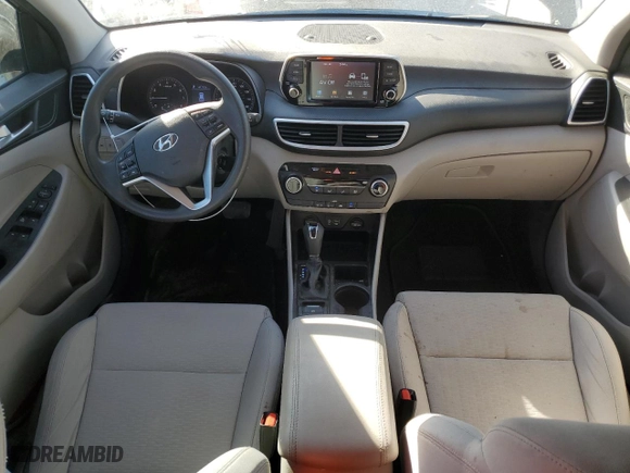 2019 Hyundai Tucson SE with VIN KM8J23A41KU945578, listed as a Copart auction lot 77248584 with 69,359 mi miles and Salvage Title. Bid and sale history available at carsss.com. Image 8.