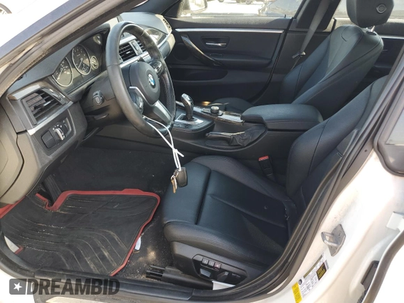 2015 BMW 4 Series 428i with VIN WBA4A9C59FGL87249, listed as a Copart auction lot 52182775 with 57,797 mi miles and Salvage title. Bid and sale history available at DreamBid. Image 7.
