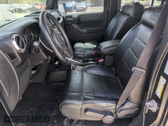 2012 Jeep Wrangler Unlimited Sahara z VIN 1C4HJWEG1CL168435, wystawiony jako Copart lot #58431615 z przebiegiem 120 364 mil mil oraz Szkoda całkowita • Salvage title. Historia ofert i sprzedaży dostępna na DreamBid. Obrazek 7.