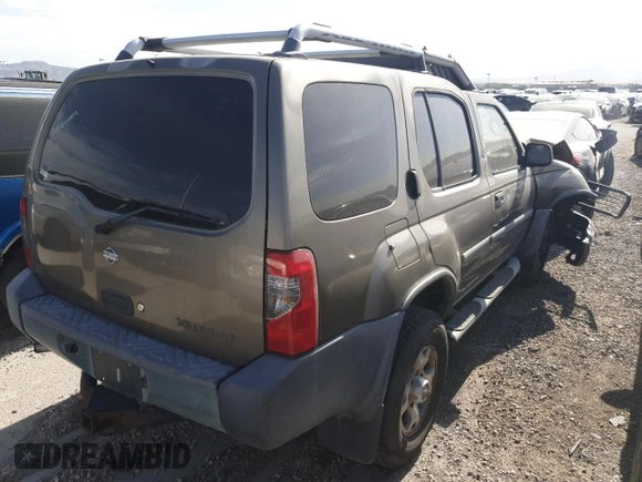 2001 Nissan Xterra XE with VIN 5N1ED28T91C541628, listed as a Copart auction lot 57712125 with 104,738 mi miles and Salvage title. Bid and sale history available at DreamBid. Image 3.