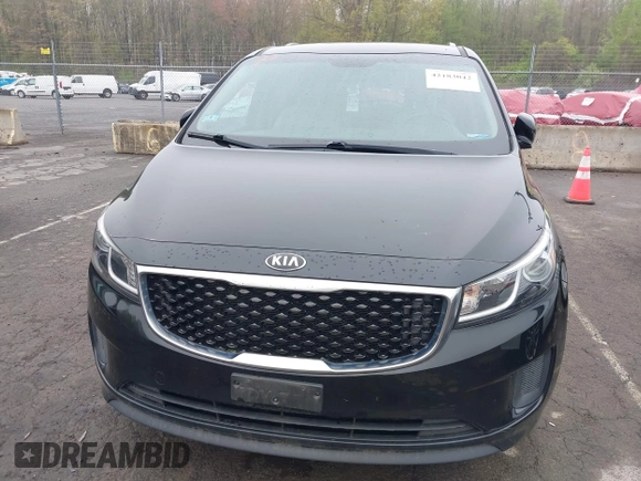 2016 Kia Sedona LX with VIN KNDMB5C1XG6171343, listed as a IAAI auction lot 42183042 with 87,740 mi miles. Bid and sale history available at carsss.com. Image 6.