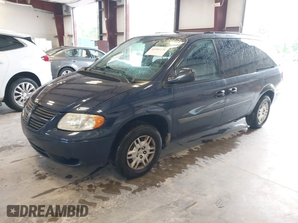 2005 Dodge Caravan SE with VIN 1D4GP24R55B294220, listed as a IAAI auction lot 42381175 with 260,980 mi miles and . Bid and sale history available at DreamBid. Image 2.