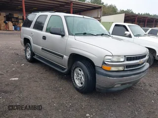 2005 Chevrolet Tahoe LT z VIN 1GNEC13T75R225390, wystawiony jako IAAI lot #41573973 z przebiegiem 299 060 mil mil oraz . Historia ofert i sprzedaży dostępna na DreamBid. Obrazek 1.