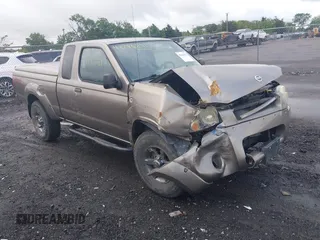 2003 Nissan Frontier XE z VIN 1N6ED26Y93C415420, wystawiony jako IAAI lot #42286631 z przebiegiem 100 823 mil mil oraz . Historia ofert i sprzedaży dostępna na DreamBid. Obrazek 1.