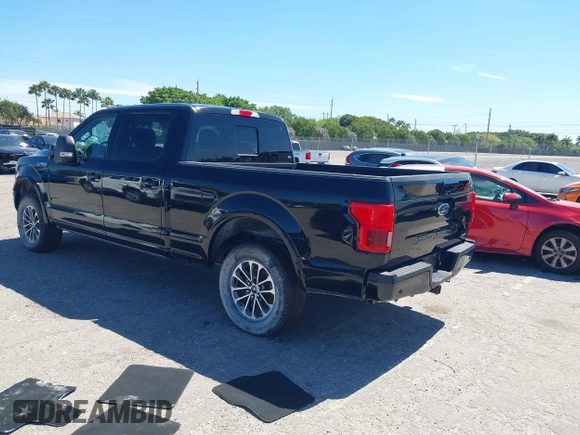 2018 Ford F-150 XL with VIN 1FTFW1EG9JFC63669, listed as a IAAI auction lot 41748012 with 143,584 mi miles. Bid and sale history available at carsss.com. Image 3.