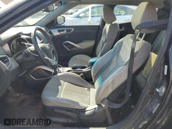 2013 Hyundai Veloster w/Black Int z VIN KMHTC6AD5DU173029, wystawiony jako Copart lot #52587455 z przebiegiem 161 716 mil mil oraz Czysty tytuł • Clean title. Historia ofert i sprzedaży dostępna na DreamBid. Obrazek 7.