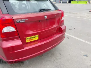 2008 Dodge Caliber SE with VIN 1B3HB28B28D742310, listed as a IAAI auction lot 42164976 with 83,561 mi miles. Bid and sale history available at carsss.com. Image 6.
