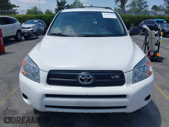2007 Toyota RAV4 with VIN JTMZK33V875013053, listed as a IAAI auction lot 42133759 with 142,572 mi miles. Bid and sale history available at carsss.com. Image 12.