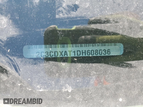 2013 Dodge Charger Police z VIN 2C3CDXAT1DH608036, wystawiony jako Copart lot #54718095 z przebiegiem 115 827 mil mil oraz Szkoda całkowita • Salvage title. Historia ofert i sprzedaży dostępna na DreamBid. Obrazek 12.