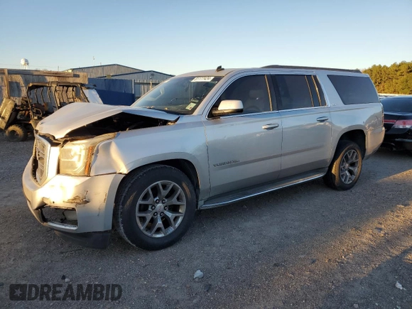 2015 GMC Yukon XL SLE z VIN 1GKS1GKC7FR285469, wystawiony jako Copart lot #81177424 z przebiegiem Nie podano mil oraz Czysty tytuł • Clean title. Historia ofert i sprzedaży dostępna na DreamBid. Obrazek 1.