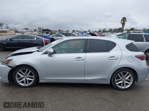 2014 Lexus CT 200h Hybrid with VIN JTHKD5BH0E2173721, listed as a IAAI auction lot 41798469 with 124,337 mi miles. Bid and sale history available at carsss.com. Image 14.