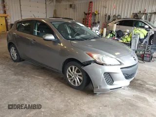 2012 Mazda 3 i Touring z VIN JM1BL1L78C1694479, wystawiony jako IAAI lot #42263730 z przebiegiem 103 025 mil mil oraz . Historia ofert i sprzedaży dostępna na DreamBid. Obrazek 1.