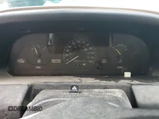 1994 Ford Escort z VIN 1FARP15J1RW125762, wystawiony jako Copart lot #85853184 z przebiegiem 75 229 mil mil oraz Szkoda całkowita • Salvage title. Historia ofert i sprzedaży dostępna na DreamBid. Obrazek 9.
