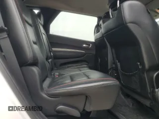 2018 Dodge Durango с VIN NY76958, выставлен на аукционе Copart как лот 55122245 с пробегом 102 413 миль миль и Списание • Salvage title. История ставок и продаж доступна на DreamBid. Изображение 11.