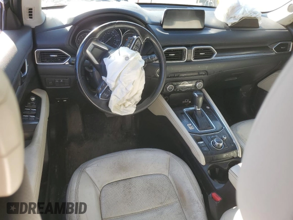 2018 Mazda CX-5 Grand Touring with VIN JM3KFADM1J1454982, listed as a Copart auction lot 49162495 with 109,559 mi miles and Salvage Title. Bid and sale history available at DreamBid. Image 8.